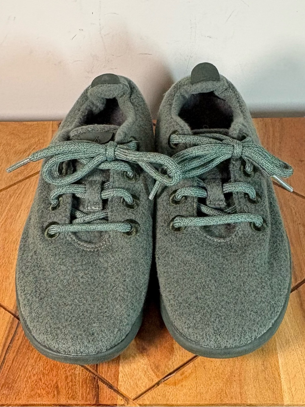Olive green Allbirds Wool Runner low-top sneakers with matching green laces W6